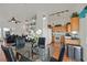 Open floor plan showcasing the dining area, living room, and kitchen with modern decor at 851 Offerman Ave, Las Vegas, NV 89123