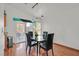 Bright dining area with hardwood floors, sliding glass doors and modern table set at 851 Offerman Ave, Las Vegas, NV 89123