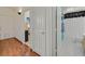 Hallway with wood floors, leading to a bedroom and bathroom at 851 Offerman Ave, Las Vegas, NV 89123
