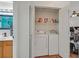 Laundry closet featuring a washer and dryer with storage space at 851 Offerman Ave, Las Vegas, NV 89123