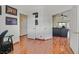 Bright living room featuring hardwood floors and access to other rooms at 851 Offerman Ave, Las Vegas, NV 89123