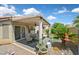 Charming covered patio, perfect for outdoor dining and entertaining, with easy access from the house at 851 Offerman Ave, Las Vegas, NV 89123