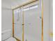 Shower with gold trim and grab bar for safety at 851 Offerman Ave, Las Vegas, NV 89123