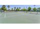 Well-maintained tennis courts with palm trees, offering a great space for recreational play at 851 Offerman Ave, Las Vegas, NV 89123