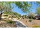 Enjoy this well-manicured community park with walkways, benches, and lush greenery at 9431 Borough Park St, Las Vegas, NV 89178