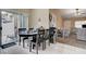 Eat-in kitchen area with sliding glass doors to the patio at 9431 Borough Park St, Las Vegas, NV 89178