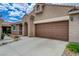 Charming single-story home with a two-car garage and desert landscaping at 9431 Borough Park St, Las Vegas, NV 89178