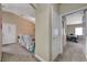 Hallway leading to the living room and an office/bedroom at 9431 Borough Park St, Las Vegas, NV 89178