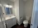 Cozy powder room with stylish mirror and classic fixtures at , Las Vegas, NV 89129