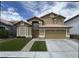 Charming two-story home with a well-manicured lawn and a two-car garage, perfect for a Gathering at , Las Vegas, NV 89129