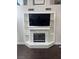 Close-up view of the modern fireplace with a TV mounted above and built in shelves at , Las Vegas, NV 89129