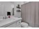 Modern bathroom featuring a vanity with toilet and shower with neutral color scheme at 9641 Rankin Ridge Ct, Las Vegas, NV 89178