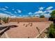 A serene backyard featuring decorative potted plants and landscaping at 1012 Vanier Ct, Henderson, NV 89052