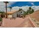 Backyard showing the covered patio and desert landscaping at 1012 Vanier Ct, Henderson, NV 89052