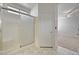 Bathroom with tiled shower and a view into bedroom at 1012 Vanier Ct, Henderson, NV 89052