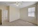 Bright bedroom with neutral carpet and ample natural light at 1012 Vanier Ct, Henderson, NV 89052