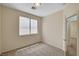 Bright bedroom featuring neutral carpet and ample natural light at 1012 Vanier Ct, Henderson, NV 89052