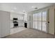 Modern kitchen featuring white cabinetry, stainless steel appliances, and ample counter space perfect for cooking and entertaining at 1012 Vanier Ct, Henderson, NV 89052