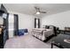 Nicely decorated bedroom featuring a modern ceiling fan and lots of natural light at 10352 Rye Patch Creek St, Las Vegas, NV 89141