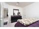 Cozy bedroom with a full bed and a dark wood dresser at 10352 Rye Patch Creek St, Las Vegas, NV 89141