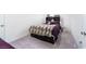 Well-lit bedroom with a full bed that features built-in drawers at 10352 Rye Patch Creek St, Las Vegas, NV 89141