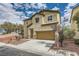 Charming two-story home featuring neutral stucco, a two-car garage, and a well-kept, low maintenance desert landscape at 10513 Bandera Mountain Ln, Las Vegas, NV 89166