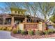 Attractive clubhouse exterior with a stone sign and meticulously maintained landscaping at 10513 Bandera Mountain Ln, Las Vegas, NV 89166