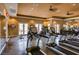 Modern gym equipped with treadmills, elliptical trainers, and mirrors for fitness enthusiasts at 10513 Bandera Mountain Ln, Las Vegas, NV 89166