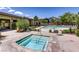 Relaxing hot tub and swimming pool surrounded by lush landscaping and comfortable seating at 10513 Bandera Mountain Ln, Las Vegas, NV 89166
