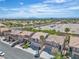 Beautiful neighborhood featuring well-kept homes with desert landscaping, set against a backdrop of distant mountains at 10613 Turquoise Valley Dr, Las Vegas, NV 89144