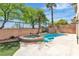Backyard pool and spa surrounded by desert landscaping and block walls, offering a private oasis for relaxation at 10613 Turquoise Valley Dr, Las Vegas, NV 89144