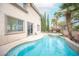 Inviting backyard pool and spa, perfect for outdoor relaxation and entertaining, with desert landscaping at 10613 Turquoise Valley Dr, Las Vegas, NV 89144