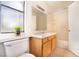 Bright bathroom featuring a single sink vanity and a shower-tub combination at 110 Wynntry Dr, Henderson, NV 89074