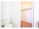 Bathroom with toilet beside walk-in closet with ample storage space at 110 Wynntry Dr, Henderson, NV 89074