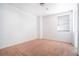 Bright bedroom featuring neutral carpet, a window, and closet space at 110 Wynntry Dr, Henderson, NV 89074