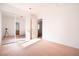 Cozy bedroom features mirrored closet and access to ensuite bathroom at 110 Wynntry Dr, Henderson, NV 89074