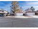 Charming two-story home with a two-car garage, mature landscaping, and a welcoming curb appeal at 110 Wynntry Dr, Henderson, NV 89074