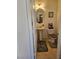 Half bath featuring neutral color palette, pedestal sink, and toilet at 1169 Paradise River Rd, Henderson, NV 89002