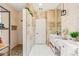 Bright bathroom featuring a walk-in shower and double vanities at 11764 Golden Moments Ave, Las Vegas, NV 89138