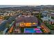 Aerial view of a modern home with a pool, patio, and well-manicured landscaping in a residential area at 11954 Camden Ridge Ct, Las Vegas, NV 89138