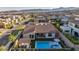 Aerial view featuring backyard with pergola, built-in kitchen and pool with lounge area at 11954 Camden Ridge Ct, Las Vegas, NV 89138