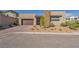 Attractive single-story home displays brick accents, well-manicured landscaping, and a welcoming entrance at 11954 Camden Ridge Ct, Las Vegas, NV 89138