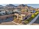 Aerial view of single story home with brick driveway and desert landscaping at 11954 Camden Ridge Ct, Las Vegas, NV 89138