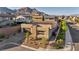 Aerial view of single story home showing desert landscaping, tile roof, and mountain views at 11954 Camden Ridge Ct, Las Vegas, NV 89138