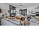 Modern living room with a sleek fireplace, comfortable seating, and elegant decor for stylish living at 11954 Camden Ridge Ct, Las Vegas, NV 89138