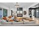 Spacious living room with modern fireplace, stylish furniture, and ample natural light at 11954 Camden Ridge Ct, Las Vegas, NV 89138