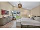 Spacious main bedroom with modern furnishings, with a backyard swimming pool visible through large windows at 11954 Camden Ridge Ct, Las Vegas, NV 89138