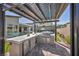 Stylish outdoor kitchen with modern appliances and ample counter space, ideal for alfresco dining at 11954 Camden Ridge Ct, Las Vegas, NV 89138