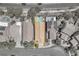 Aerial view of a home with a pool in a neighborhood with mature landscaping at 1212 Anime Dr, Las Vegas, NV 89144