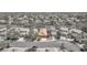 Beautiful aerial view of a home showcasing its well-manicured lawn and charming neighborhood at 1212 Anime Dr, Las Vegas, NV 89144